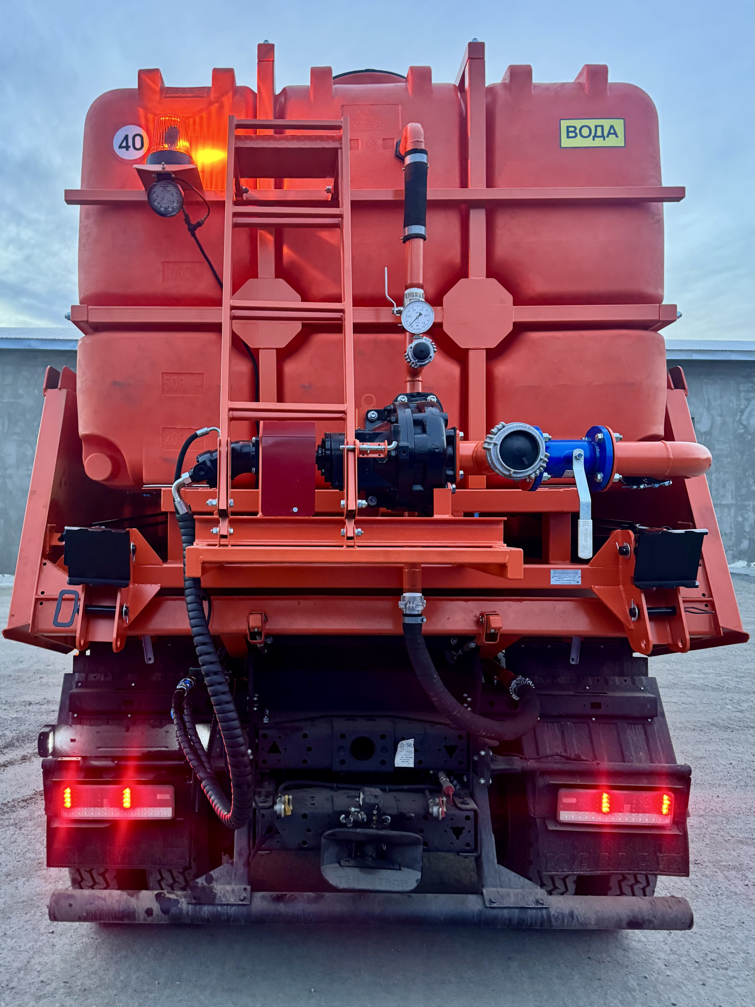 Поливомоечный автомобиль КАМАЗ 65115 (9110К2)